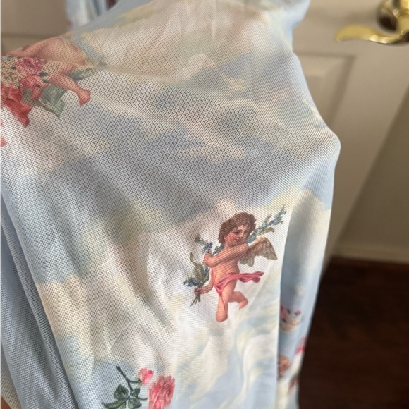 Dolls Kill Blue Cloud & Cherub Print Flared Leggings - Picture 4 of 7